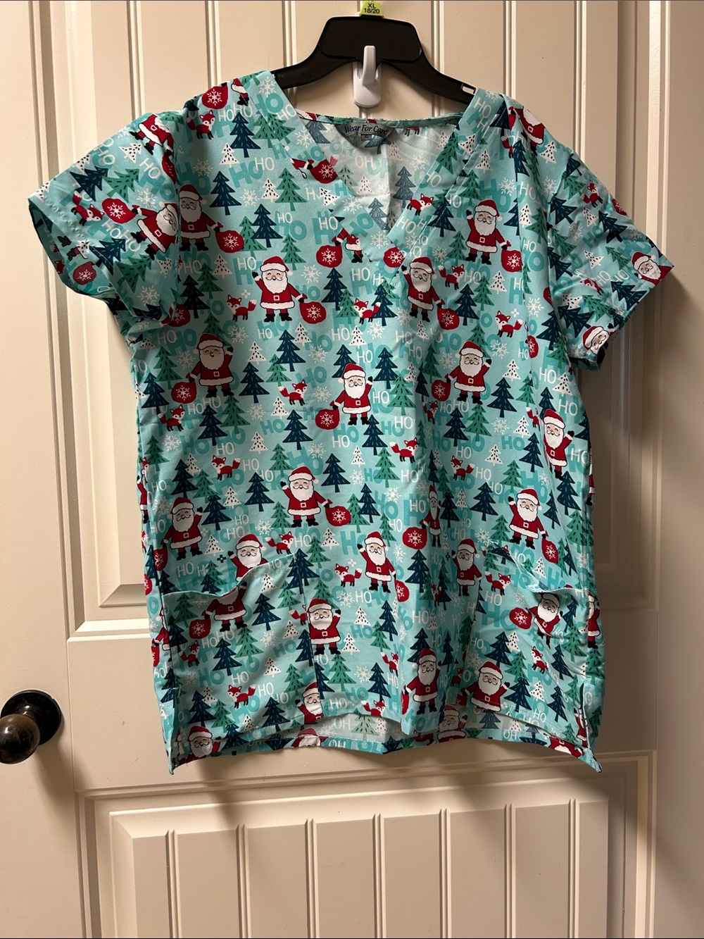 Women's Holiday Santa Print Tunic Top - Aqua—-scrub top
